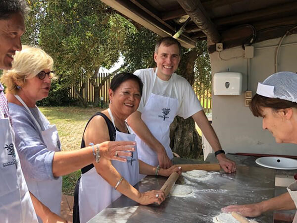 Margaret and Bruce making pizza